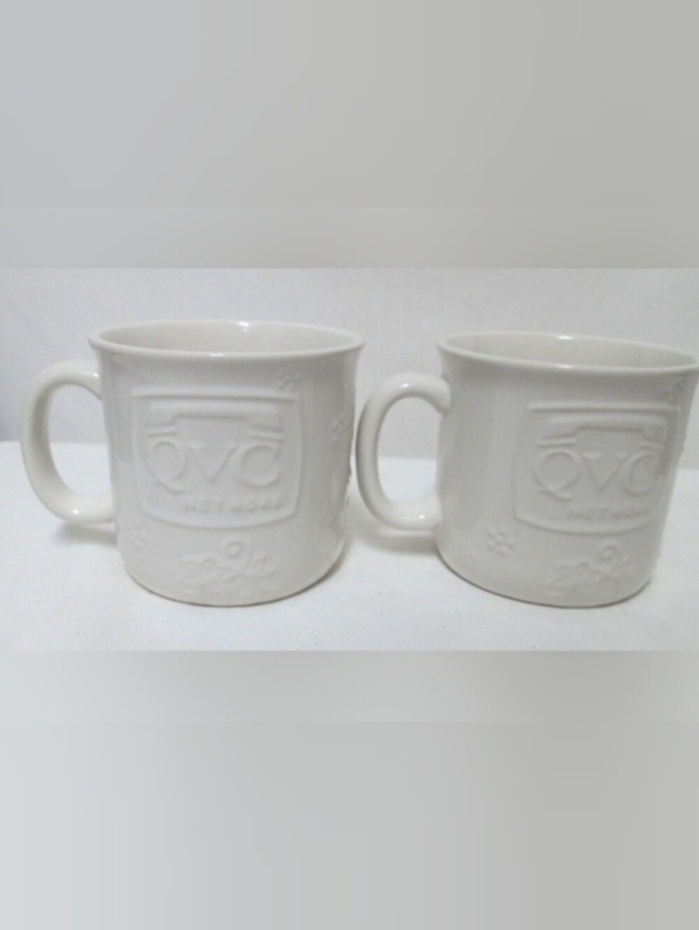 QVC Network White Embossed Ceramic Coffee Shopping Channel Mug Set